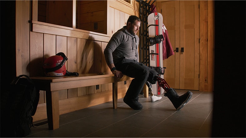 Mike Schultz sits on a bench.