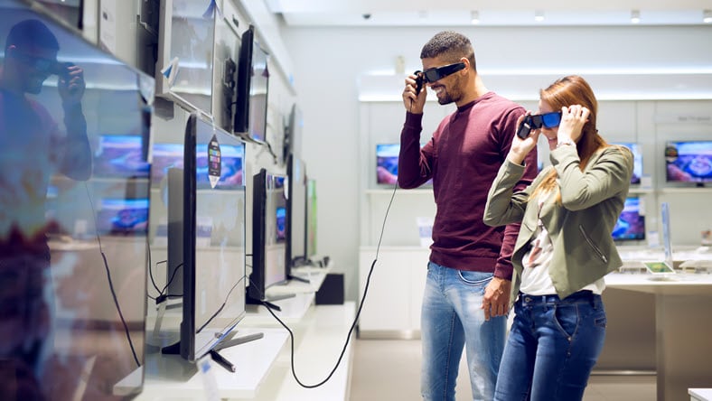 Man and woman using VR headsets