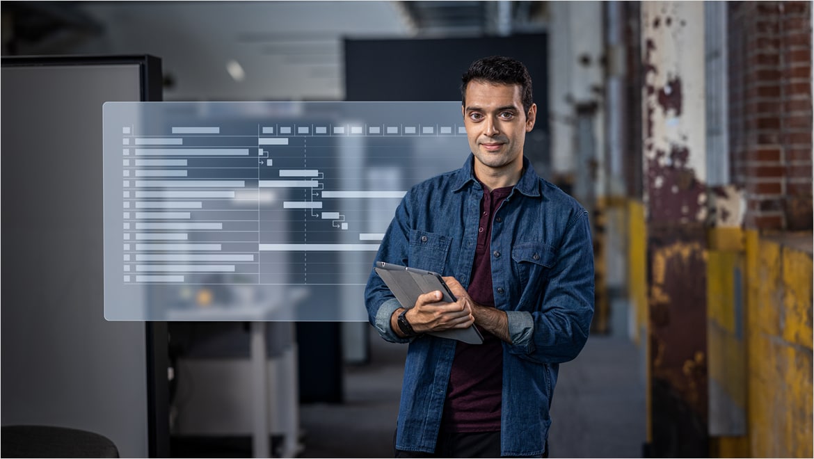 Man using PLM system to track product lifecycle