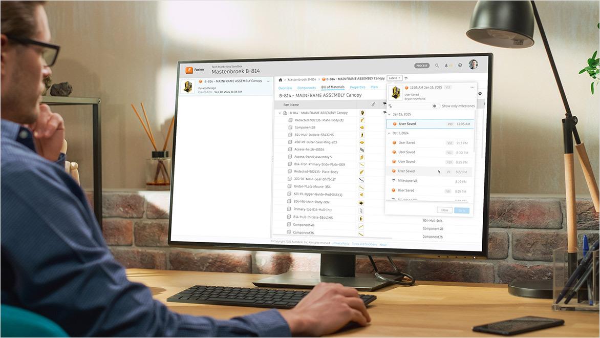 Man using Autodesk Fusion for product data management.