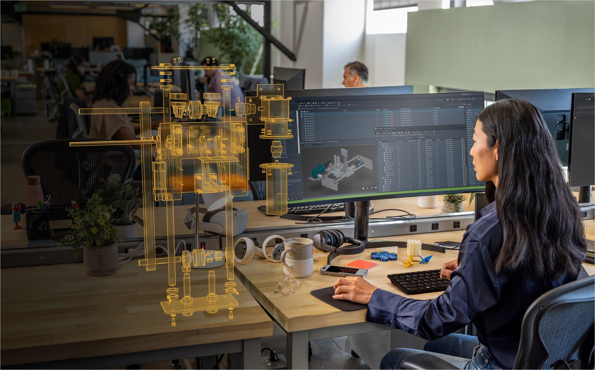 Woman using Autodesk PLM software solution.