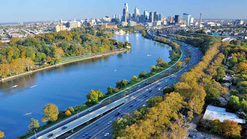 Aerial view of highway and Philadelphia skyline