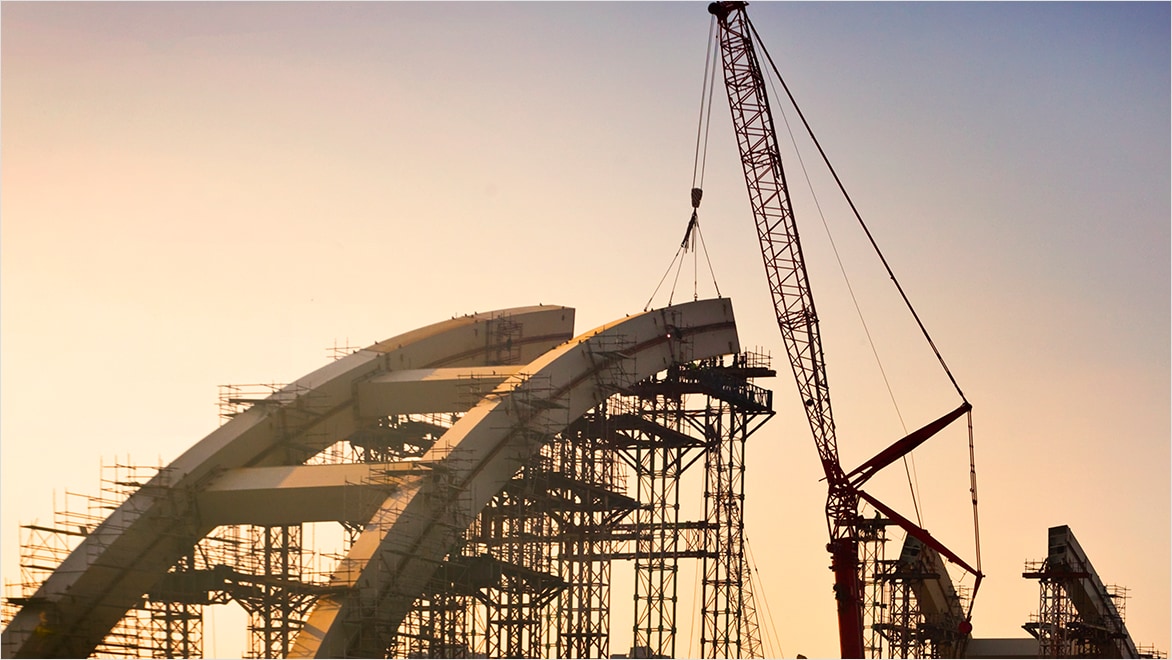 Bridge construction at sunset