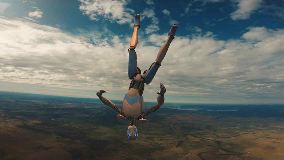 Humanoid robot skydiving upside down.