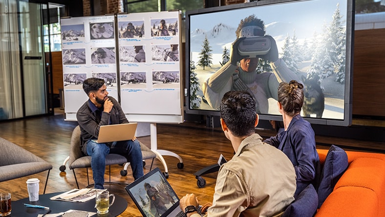 Team discussing a film edit and review in a media and entertainment studio