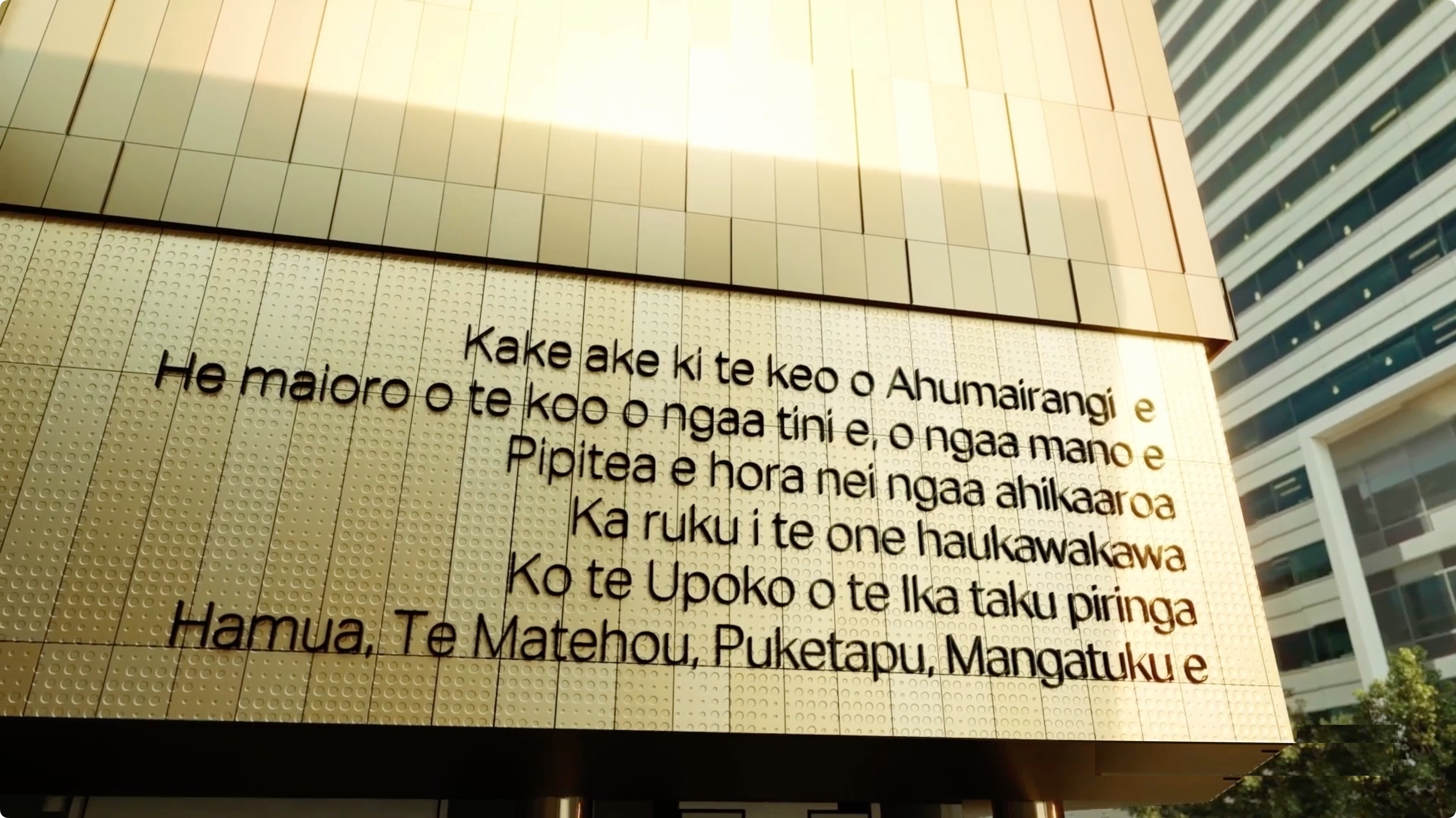 Modern museum in downtown Wellington, New Zealand with inscriptions on the side of the building in native Mãori language