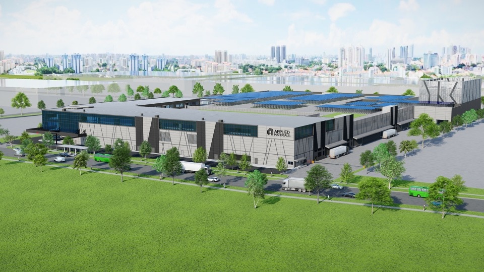 Rendering of a modern manufacturing plant in Singapore with trees and lawn in the foreground and cityscape in the distance