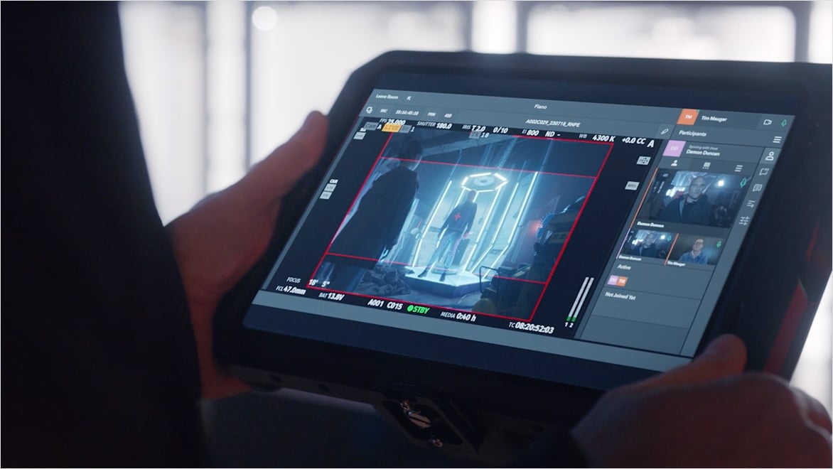 Director reviewing footage on tablet