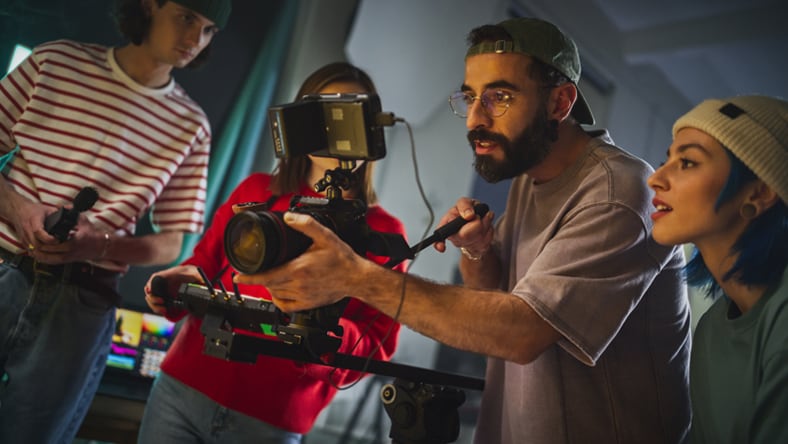 Group of young filmmakers on set