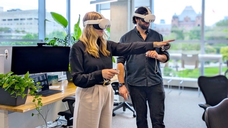 Production engineers discussing factory process in conference room