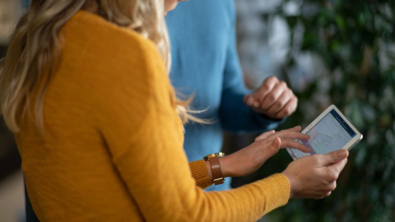 People working with AutoCAD in a small business or startup environment.