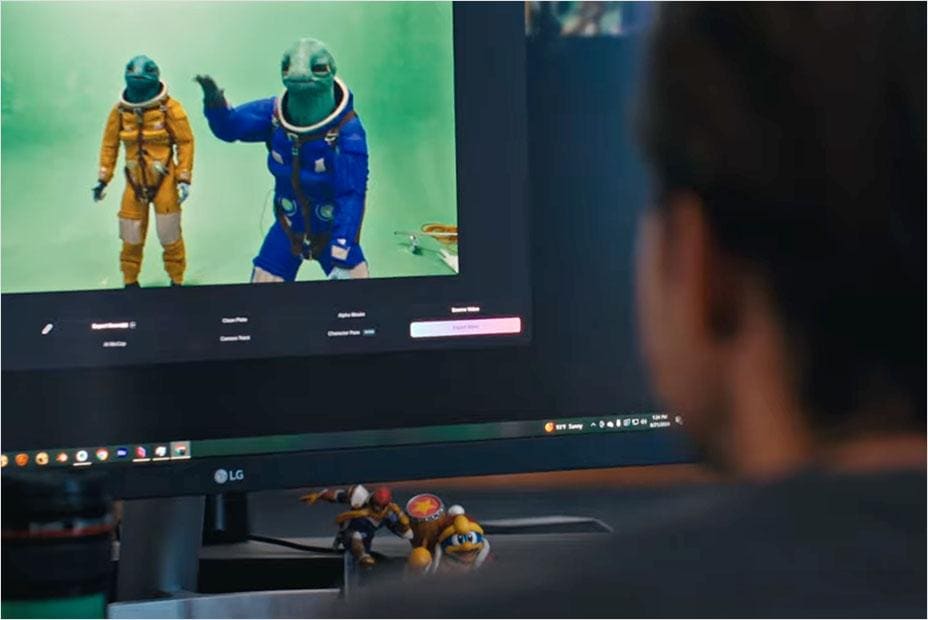 man working on an alien character