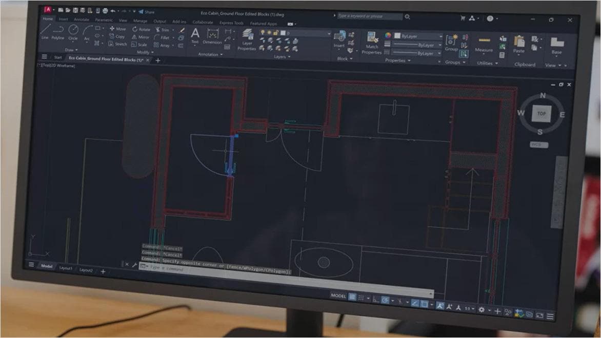AutoCAD floor plan using dynamic door and window blocks.