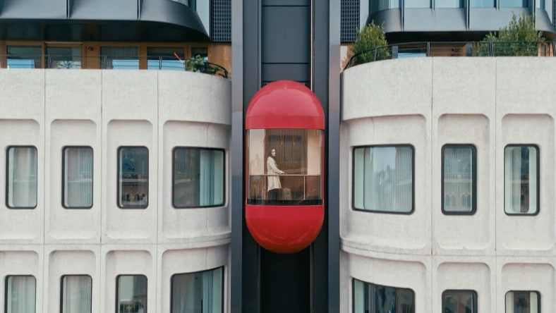 An adaptive reuse project by Orms Designers and Architects London showing an elevator moving up The Standard London.