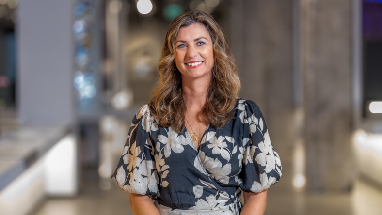 Employee smiling in a professional office setting
