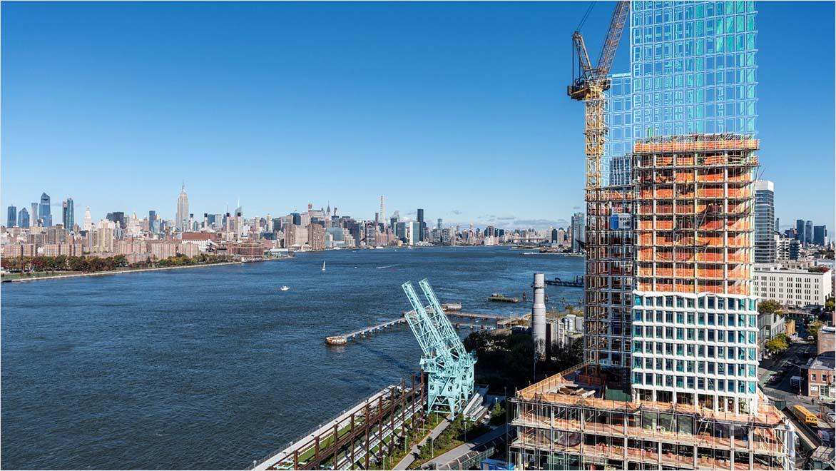 Construction high-rise building with digital AI design overlay by waterfront skyline..
