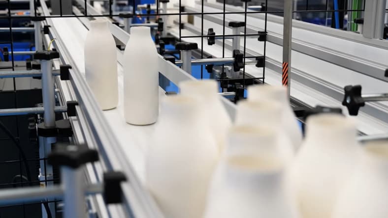 Pulpex bottles on an assembly line.