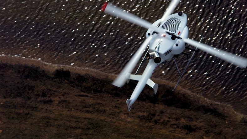 SwissDrones unmanned helicopter in flight.