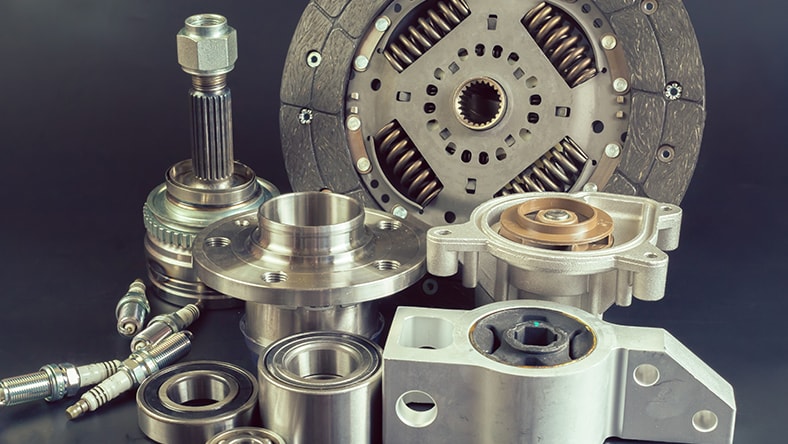 Automotive CNC machined parts using mill-turn software.