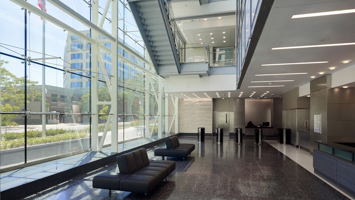 An image of the sun-filled lobby of a sustainable building complex.