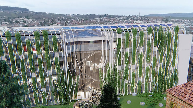 biophilic building design featuring lush vegetation on the exterior 