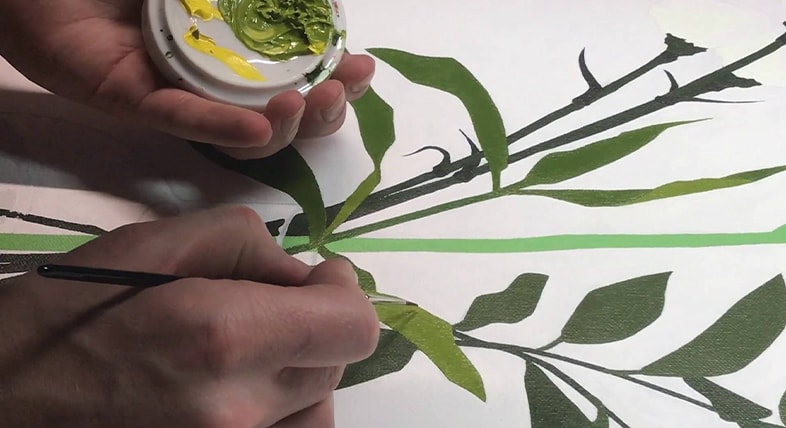 Painting leaves with a paintbrush
