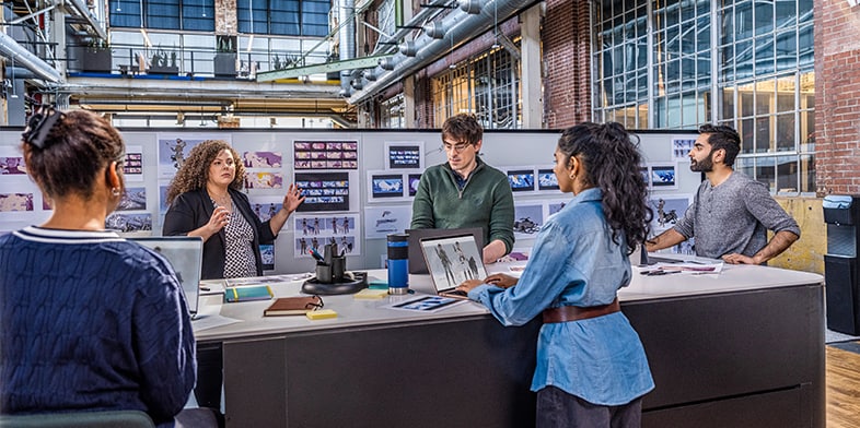 Teams collaborating in a media and entertainment studio.