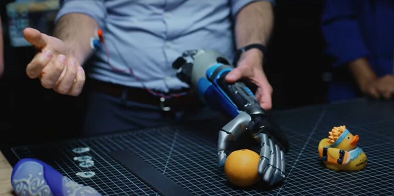 Students experiment with bionic arm prototypes.