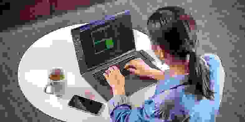 Person working In AutoCAD LT on a laptop