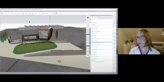 A person is participating in a virtual meeting, presenting a 3D architectural model on the screen. The design includes buildings, a green area, and a surrounding layout. The person is in the bottom right corner wearing glasses and headphones.
