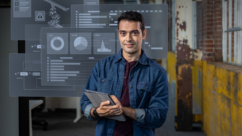 Woman using Fusion Manage on laptop to identify issue with product component