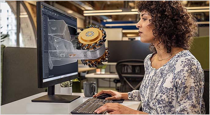 Engineer working on 3D product design in Fusion 360, showcasing advanced modeling and simulation tools for streamlined manufacturing workflows.