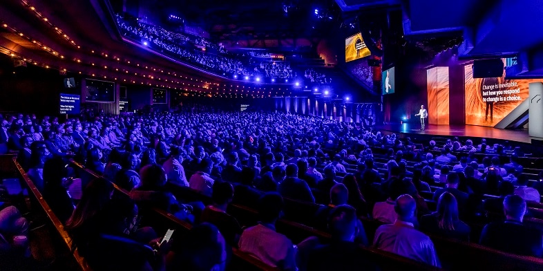 Autodesk conference audience watches a live onstage presentation