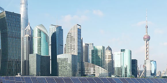 A 3D rendering of solar panels and high-rises  