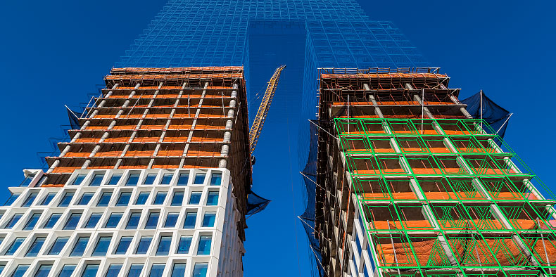 Two high-rise towers of the Domino Sugar Factory redevelopment project in Brooklyn, New York shown with wireframe overlay 