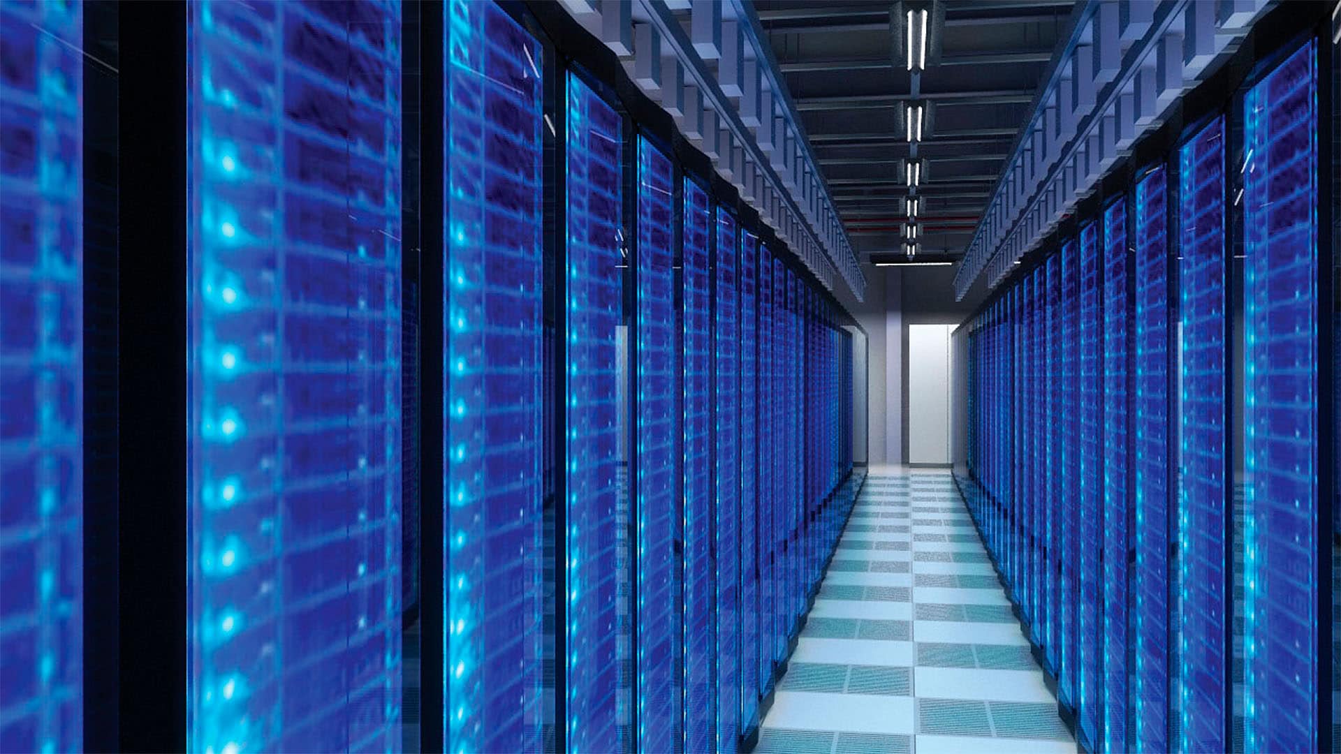 Corridor in server room with blue-tinged servers on both sides