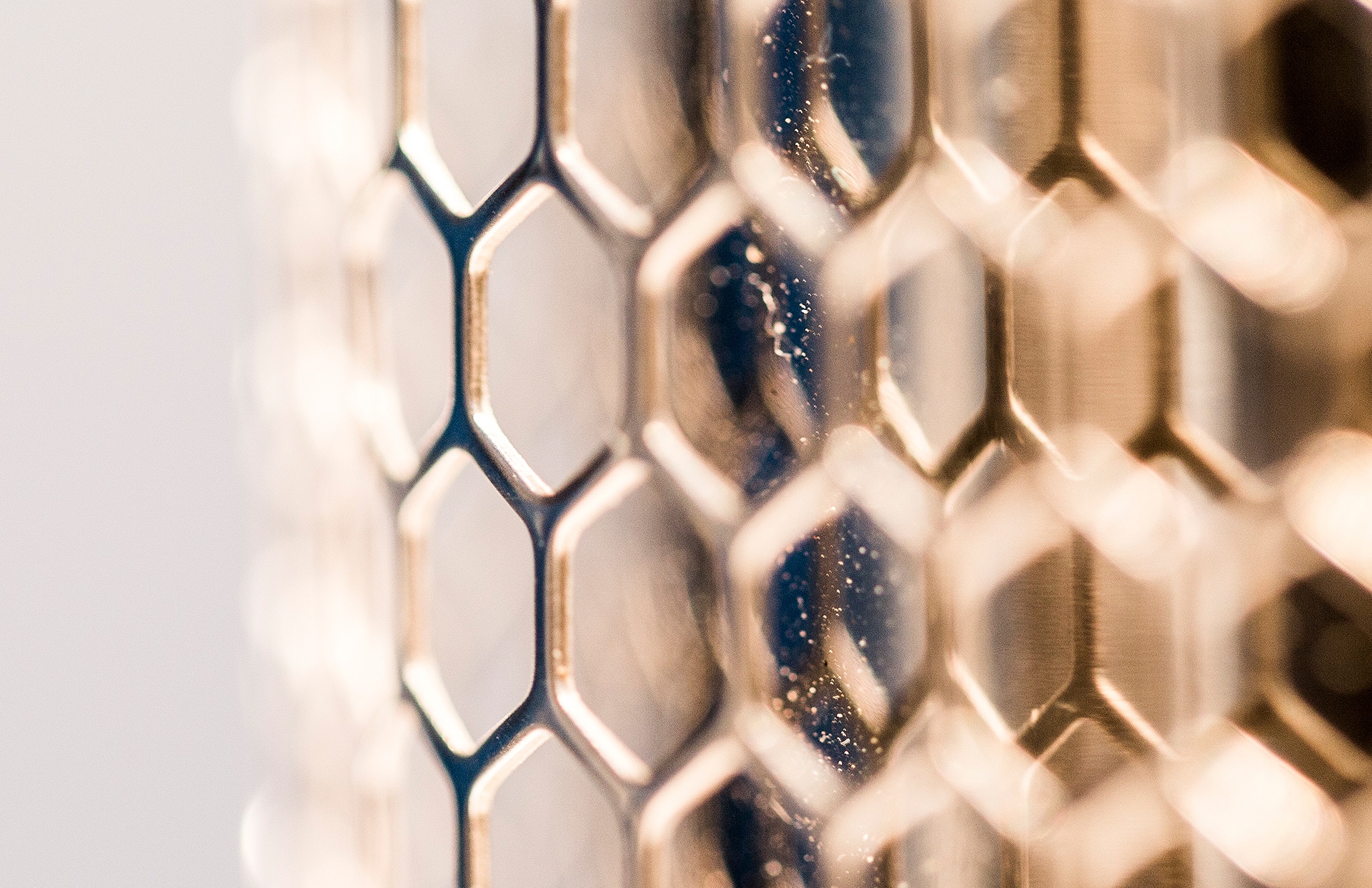 Closeup of bee-hive pattern fence