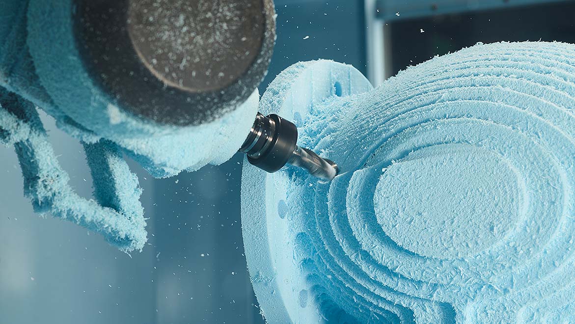 A drill shaping material into spirals.