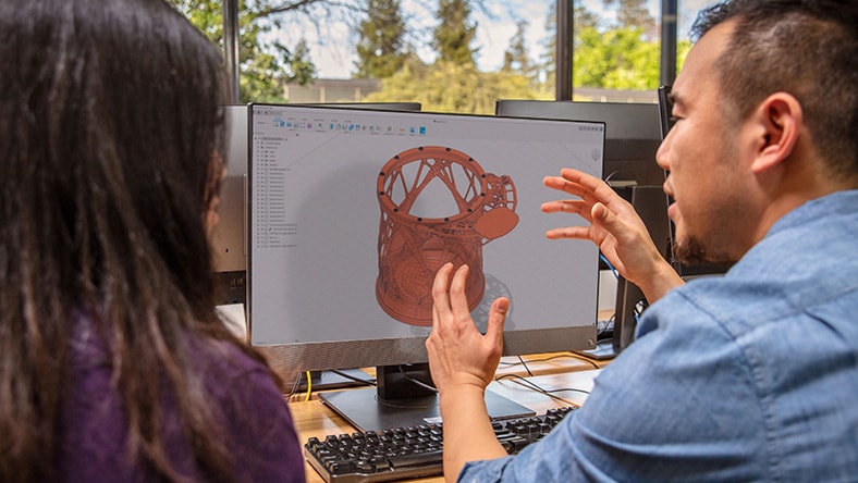 Teacher and a student using Fusion 360