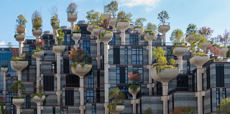 A high-rise building incorporating plants and greenery in the building design
