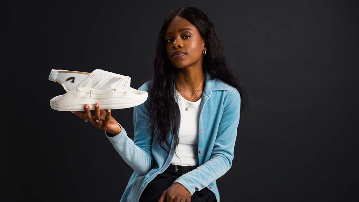 Golden wireframe collage of a stadium, headphones, and a VFX dragon, showcasing Autodesk's versatility of Design and Make Platform.