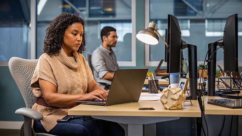 Woman working at her laptop.