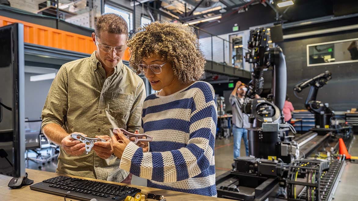 People working together in a robotics lab