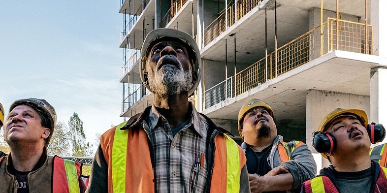 Construction crew with surprised looks on their faces