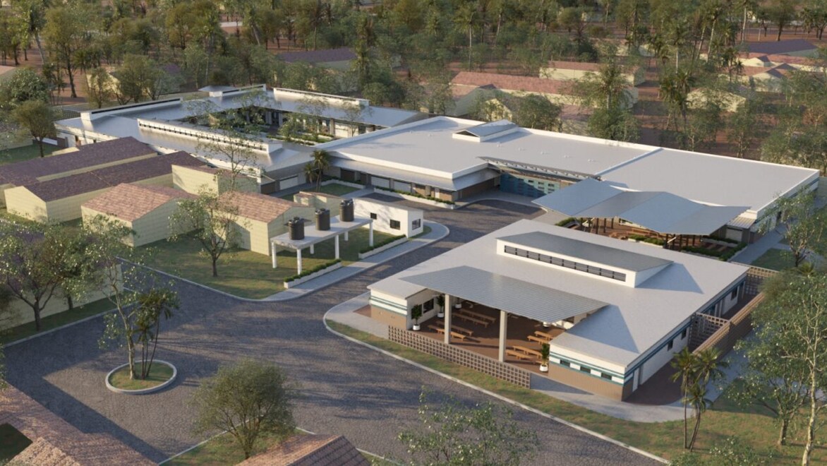 Aerial rendering of the MCOE — a semi-circular array of 2-story buildings surrounded by palm trees, a parking light in the foreground, and forested area in the background.