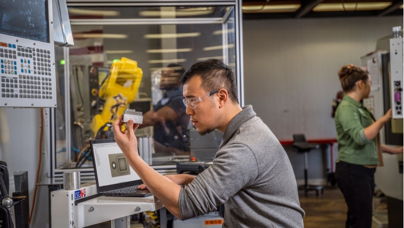 machinist using Autodesk software