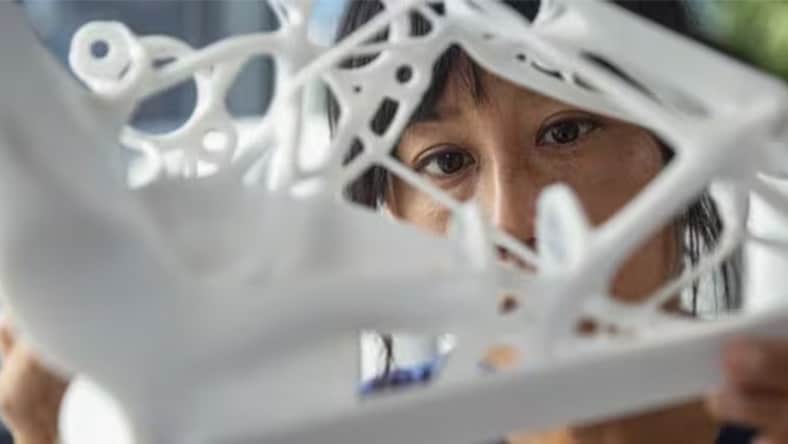 female engineer working on 3D manufacturing part