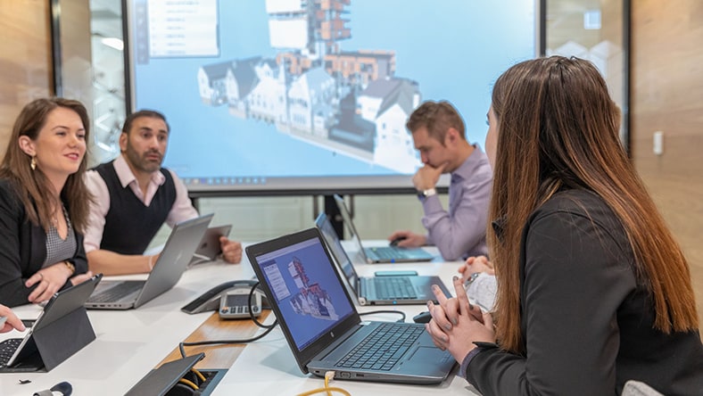 Owner evaluates bids for cost and merit