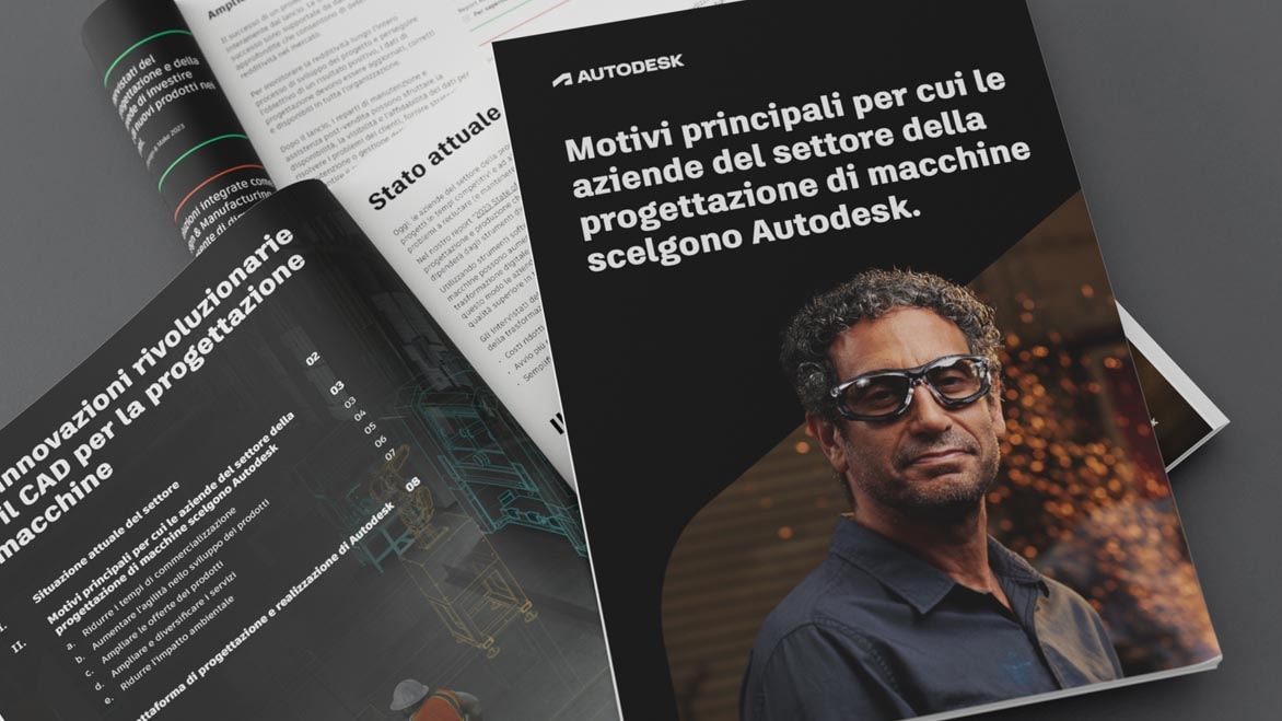 Designer and engineer standing in shop, looking at illustrated outline of machine CAD model 