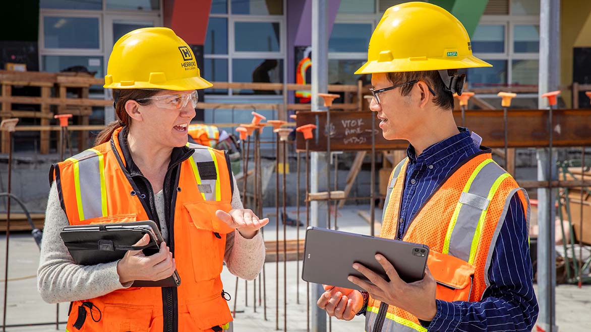 Construction team using tablets for jobsite coordination